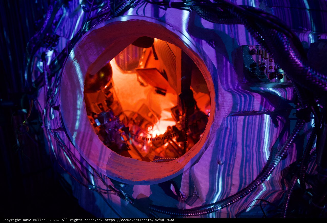 Inside the Cosmic Portal: Orange-Lit Installation View