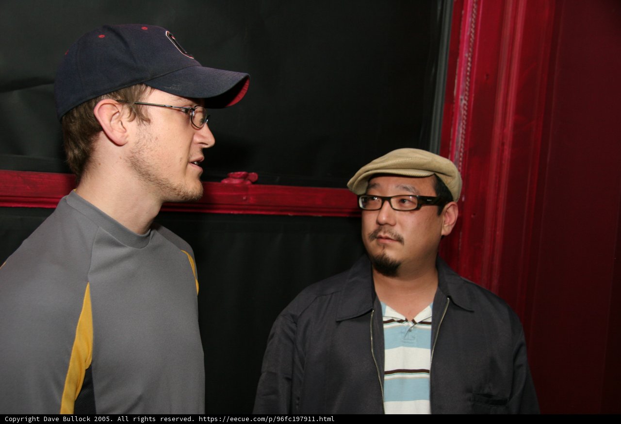 Two Men in Hats and Glasses