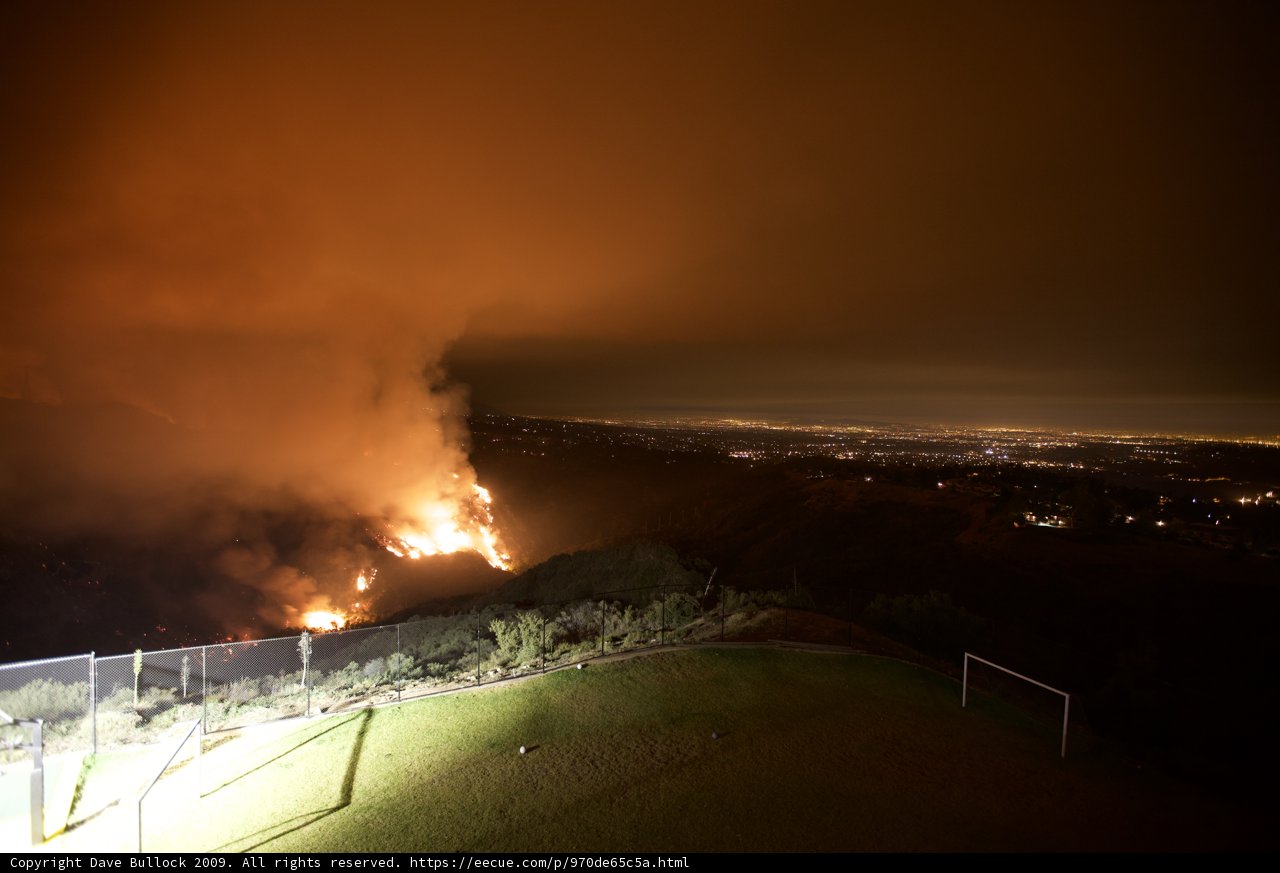 Nighttime Flames Engulf Hills in Station Fire