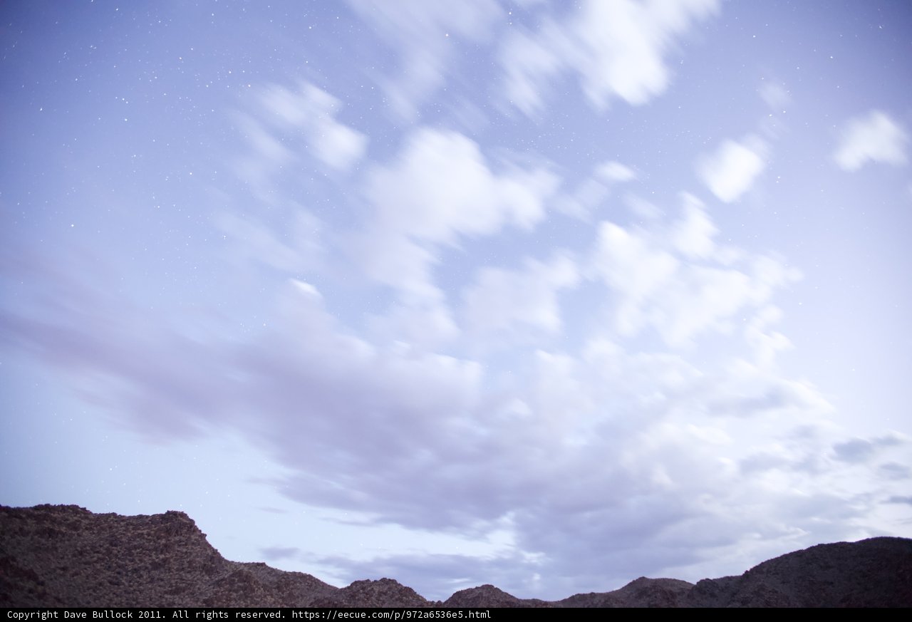Majestic Mountain Range with Clouds