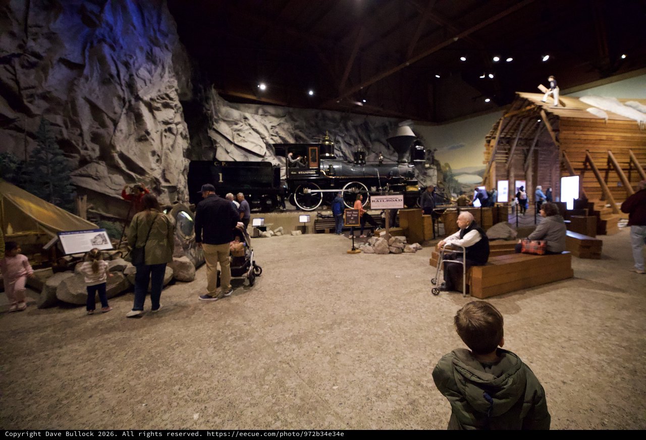 Historic Steam Locomotive Display in Museum Cave Setting