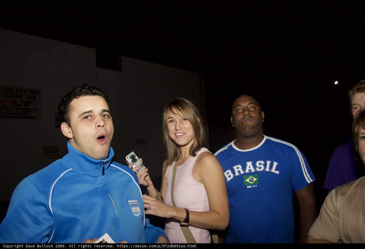 Blue-Shirted Man with Microphone