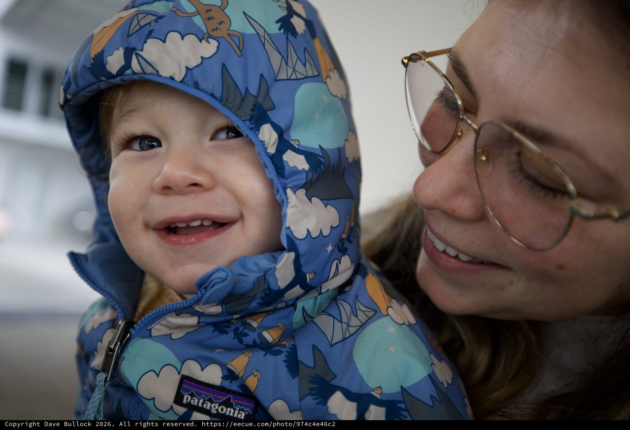 Joyful Winter Moment: Mother and Child Bonding