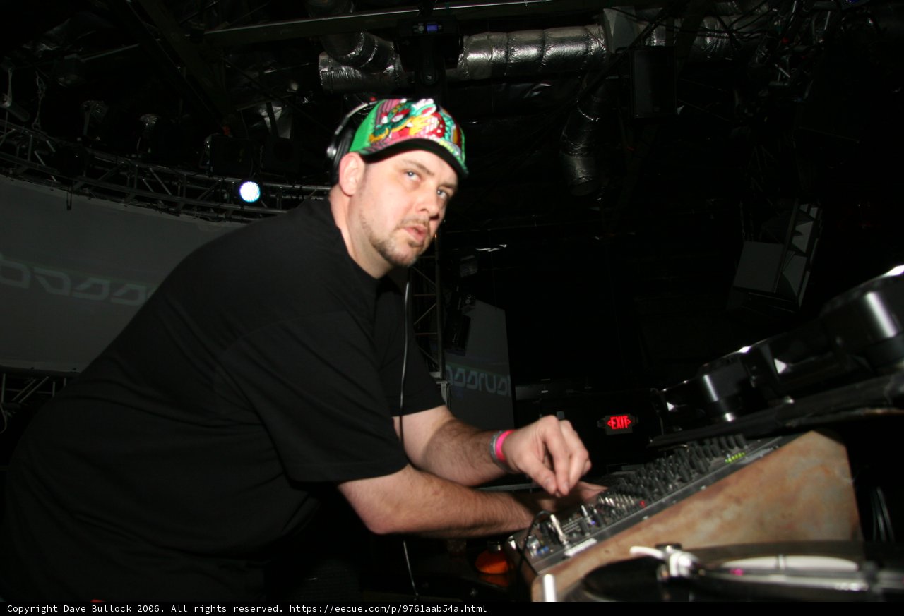 Funky DJ in Black Hat and Baseball Cap