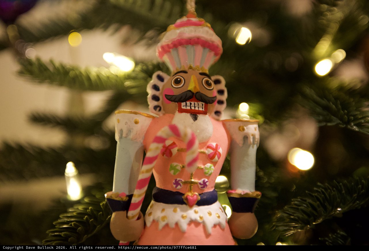 Whimsical Nutcracker Ornament on Decorated Christmas Tree