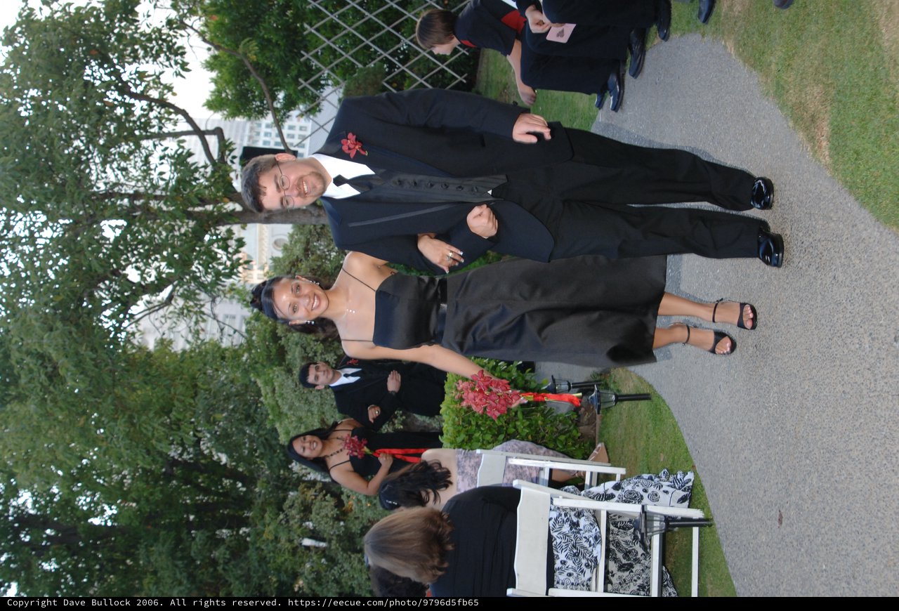 Joyful Couple Walks the Aisle at Outdoor Wedding