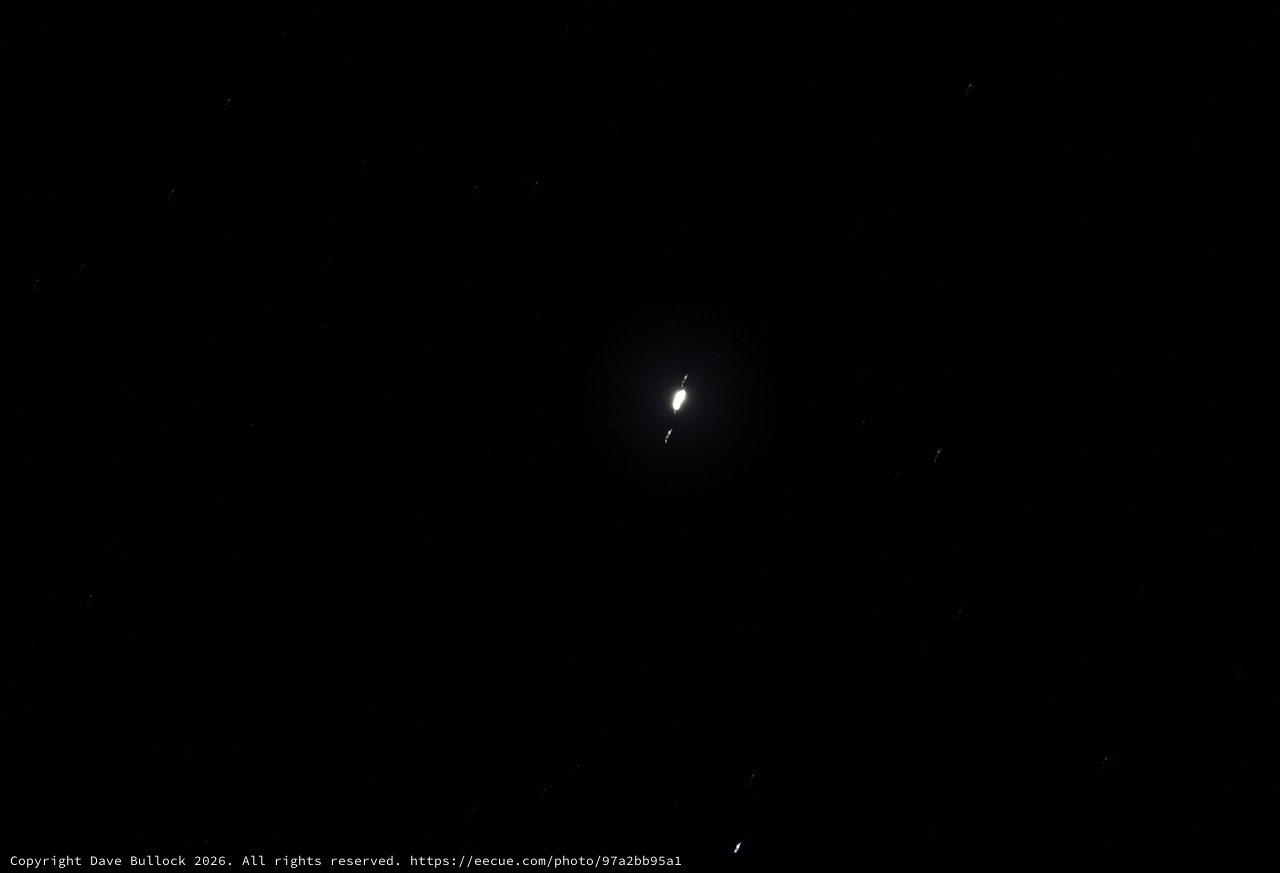 Jupiter and Its Galilean Moons in Night Sky