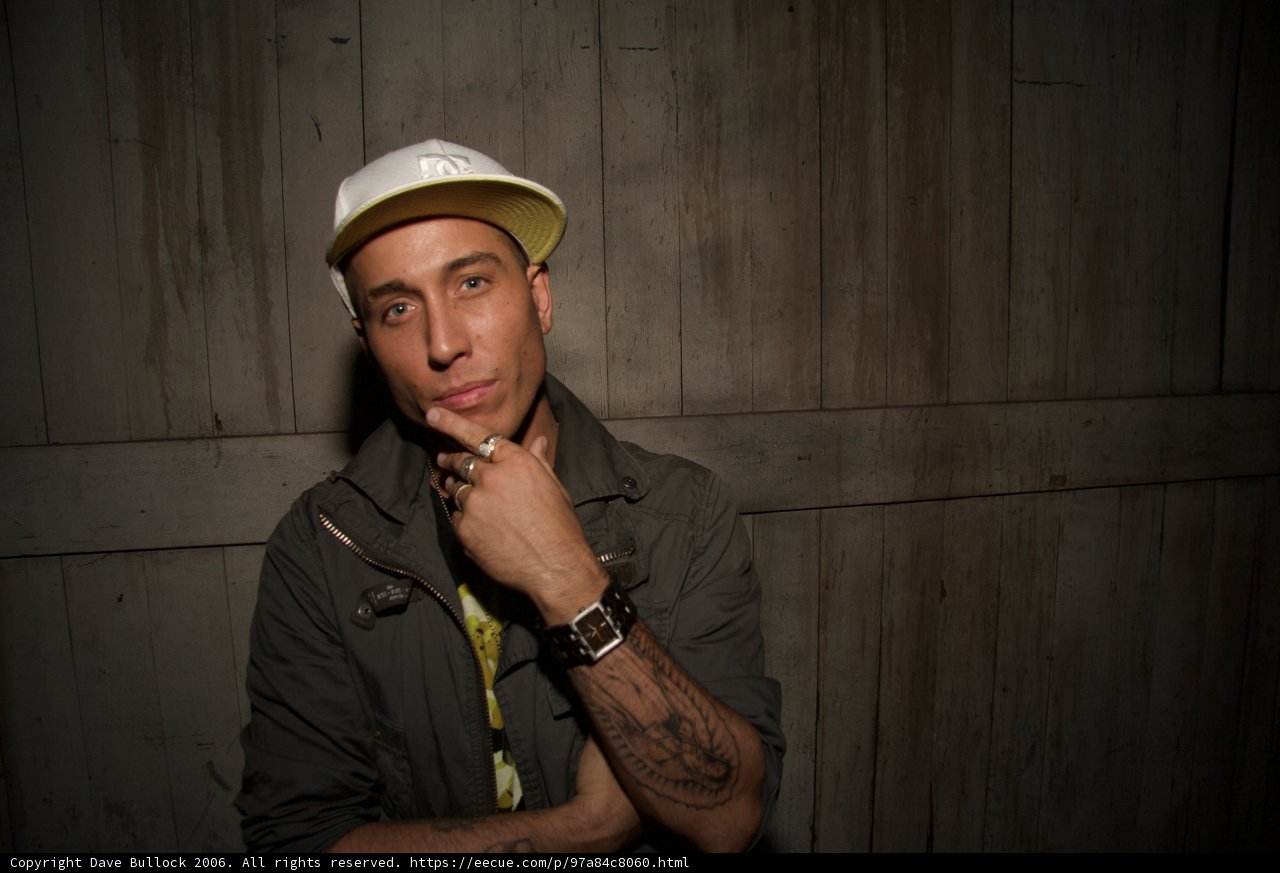 Tattooed Man with a Hat