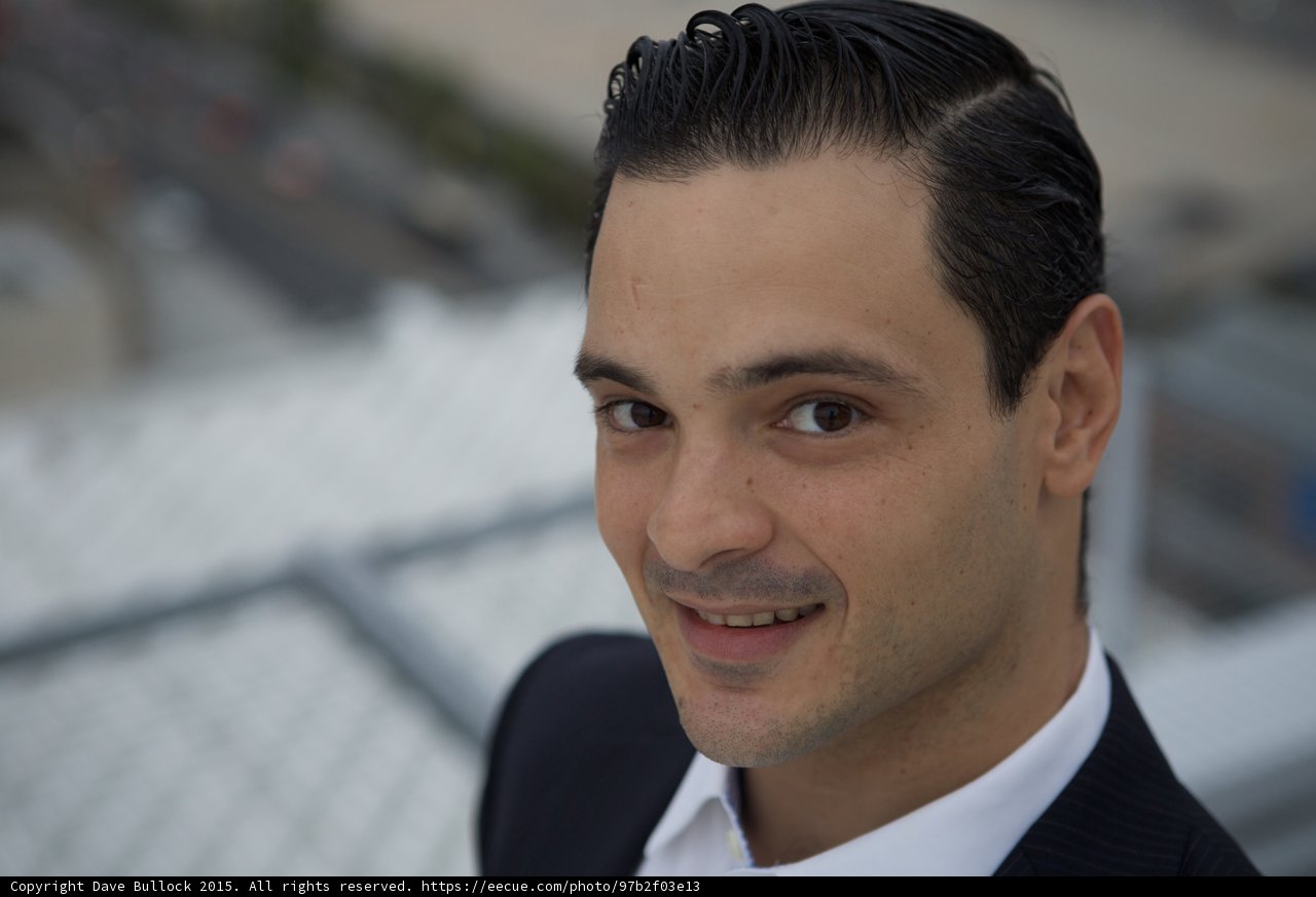 The Happy Man in a Suit