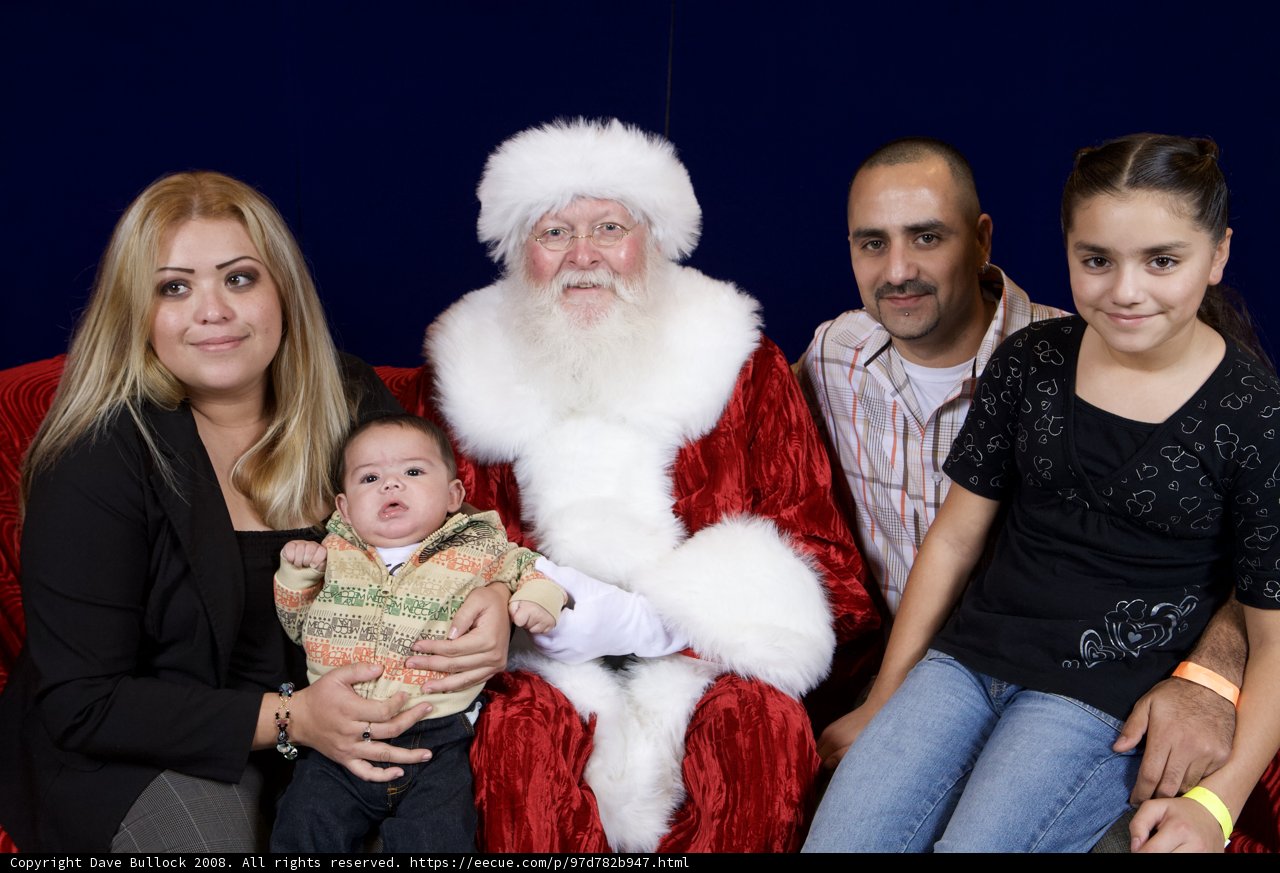A Festive Family Photo with Santa Claus