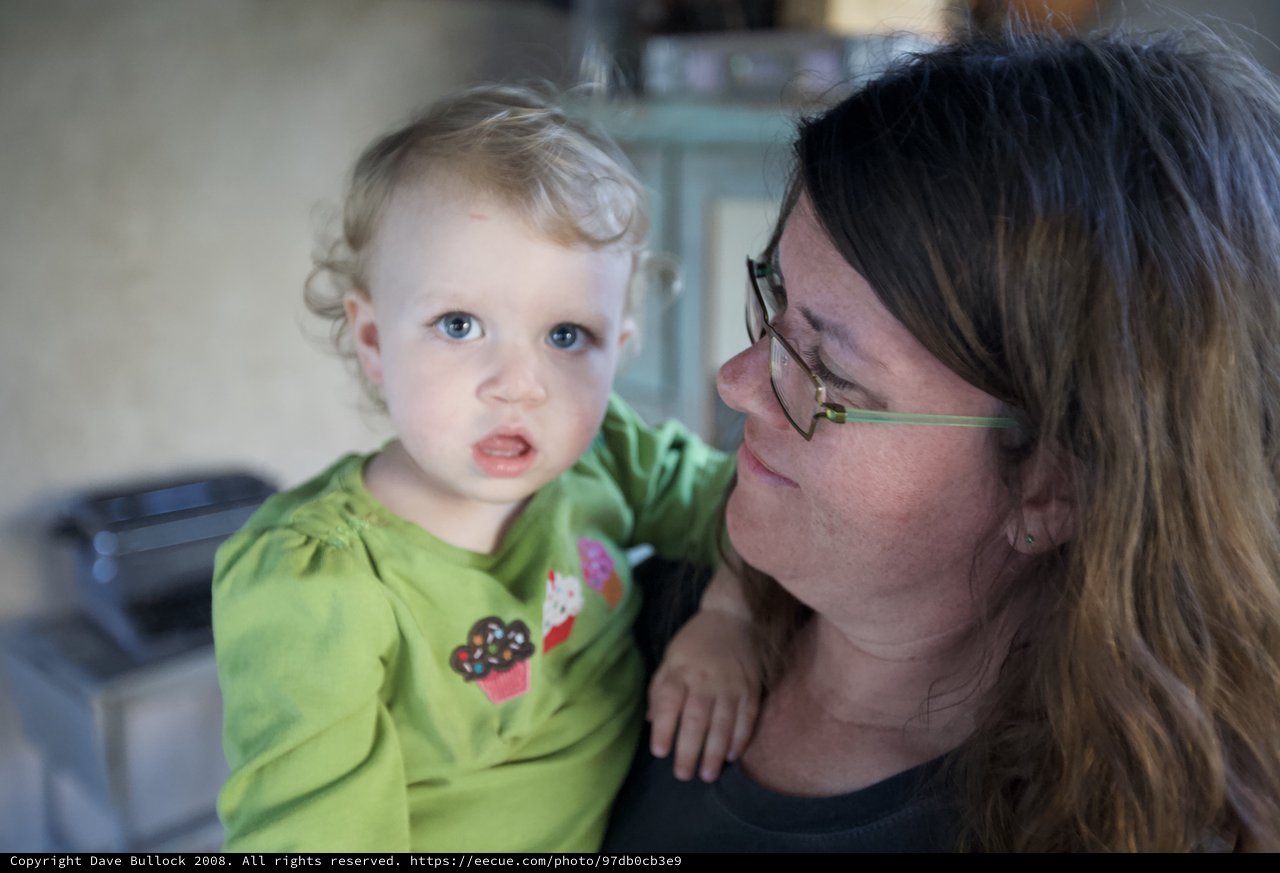 Tender Moment Between Mother and Toddler Daughter