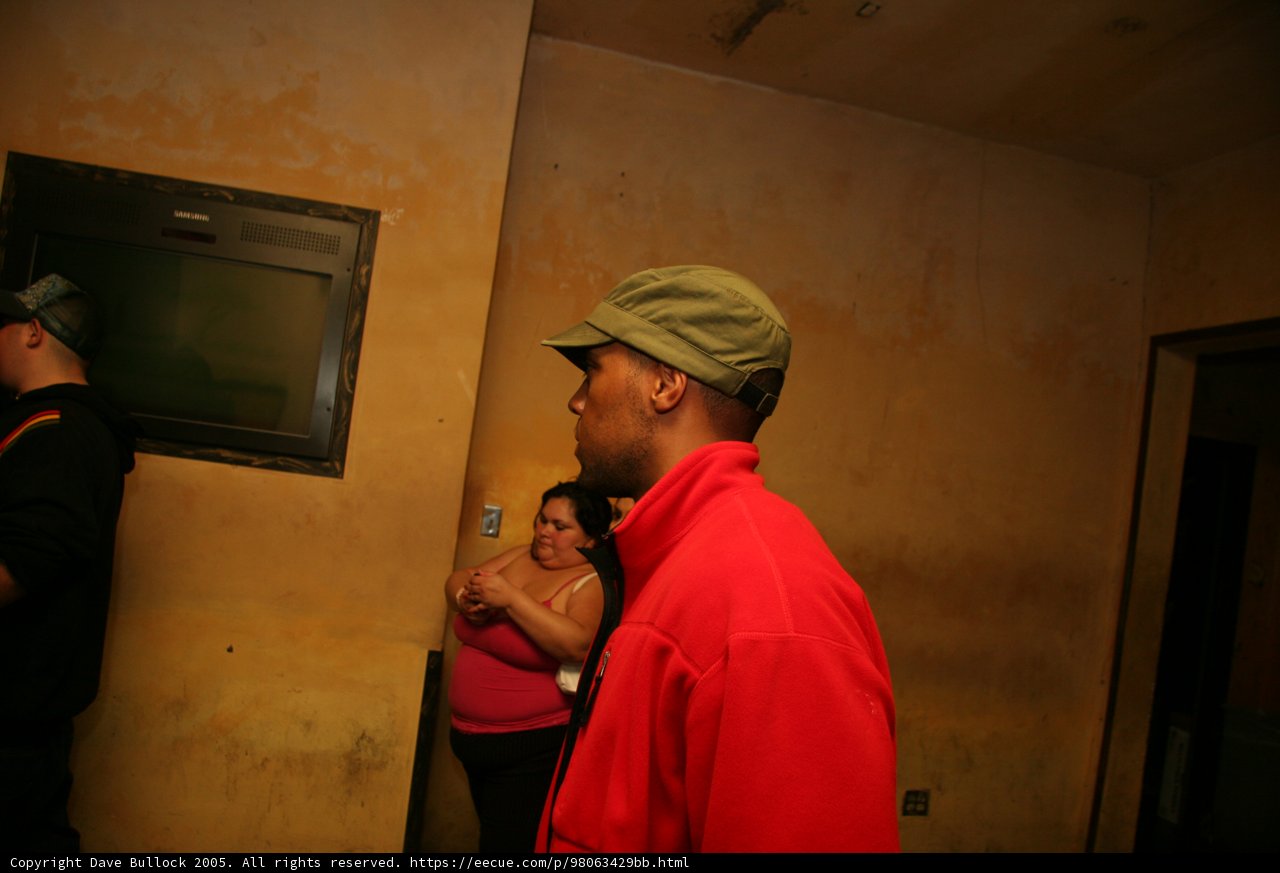 Red Shirted Man in a Baseball Cap