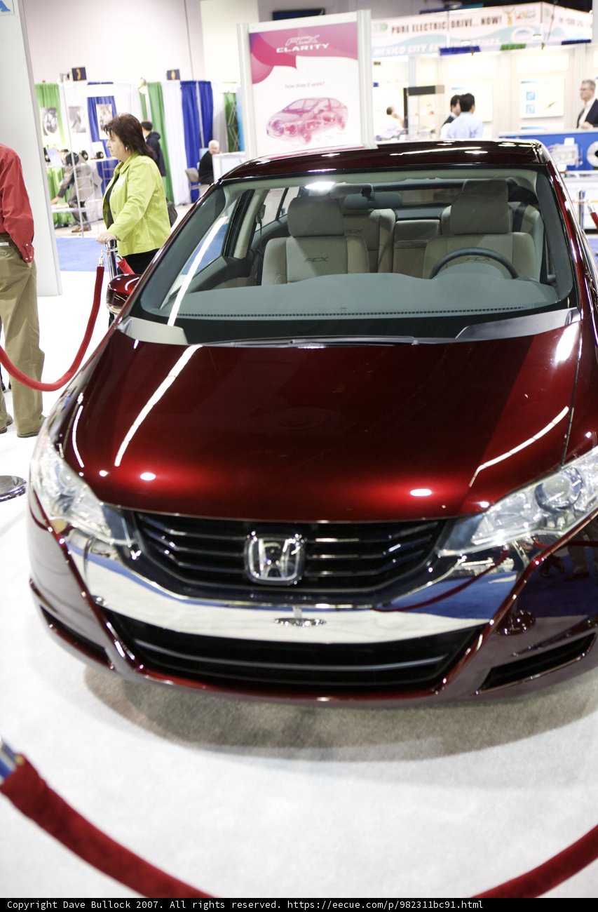 Red Honda Sports Car Shines at Car Show