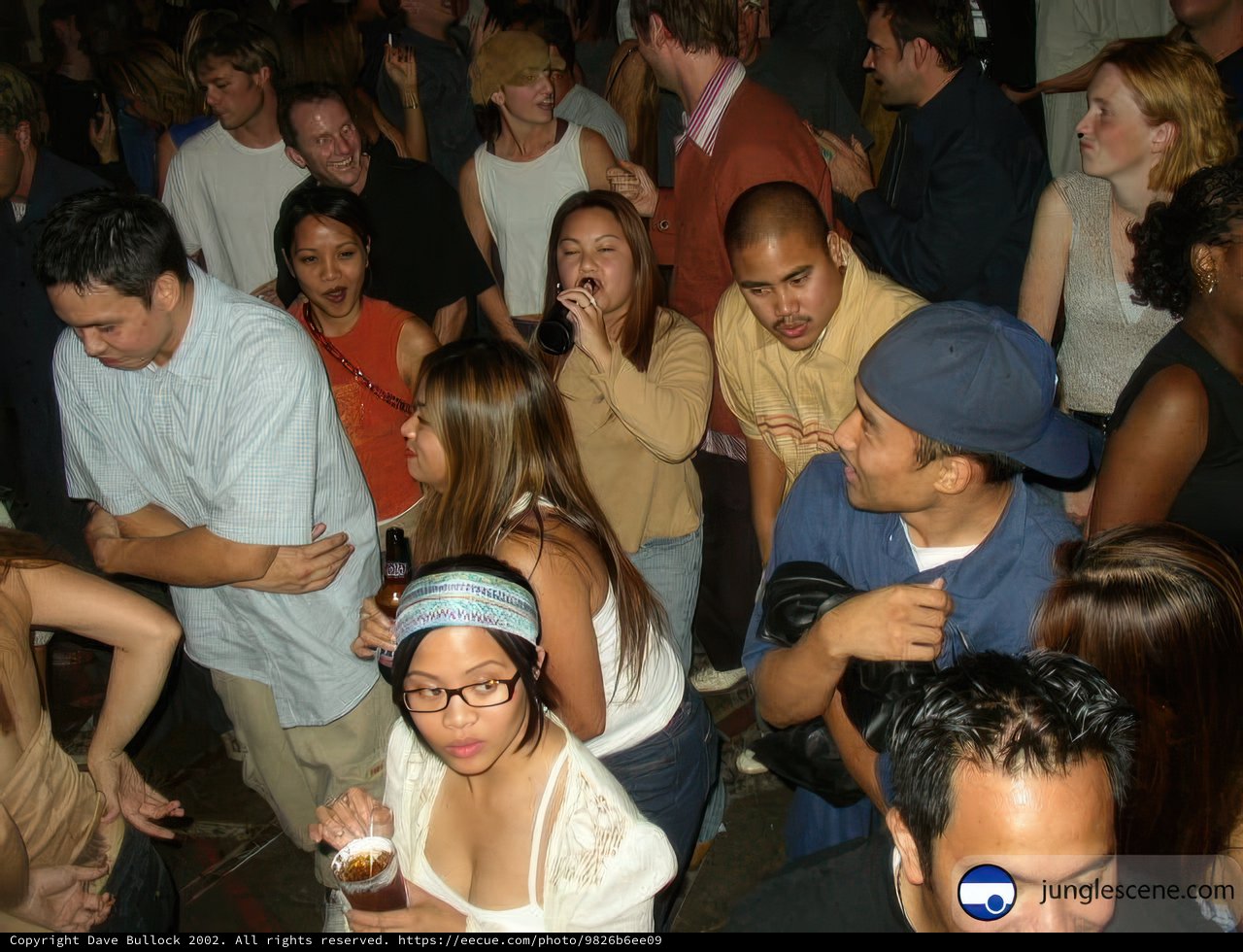 Party-goers in a Baseball Cap