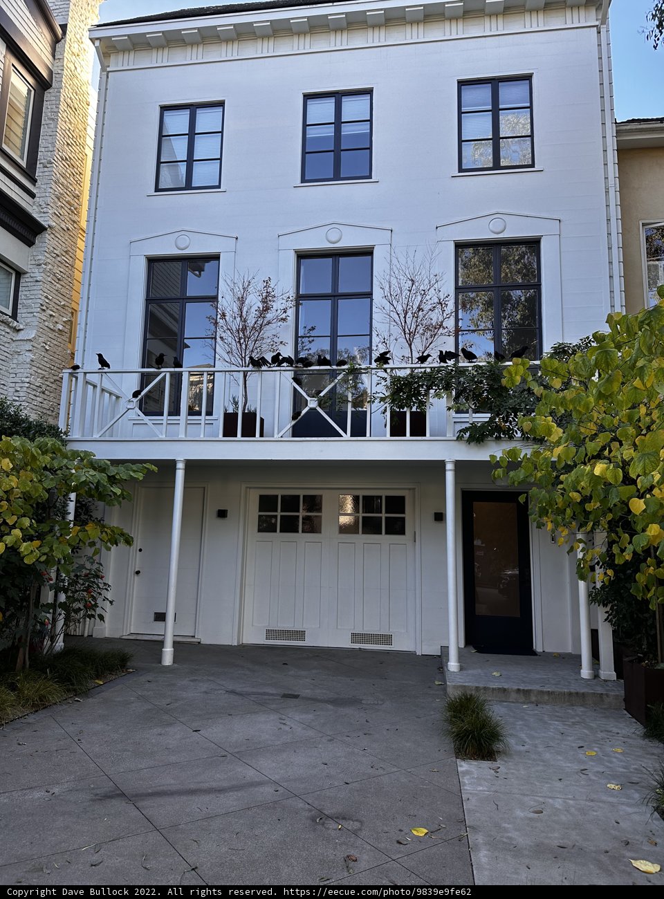 White Urban House with Balcony