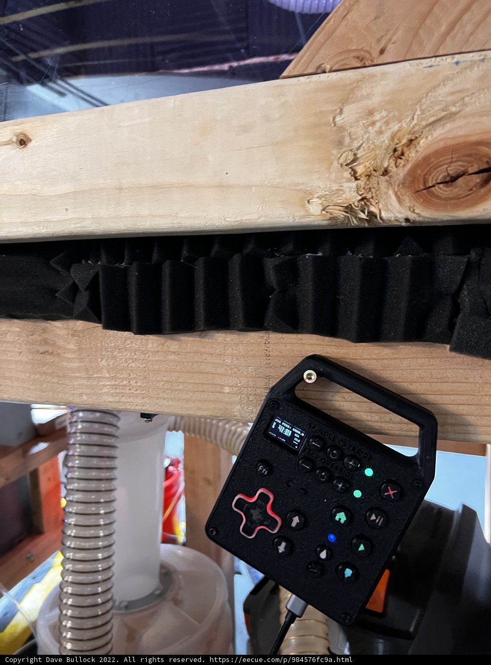 Remote Control on Wooden Beam