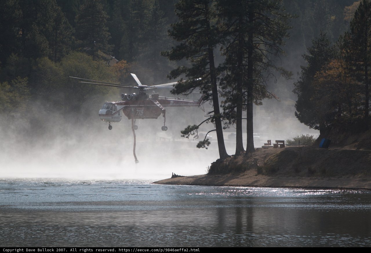 Helicopter Fighting Fire Above Lake