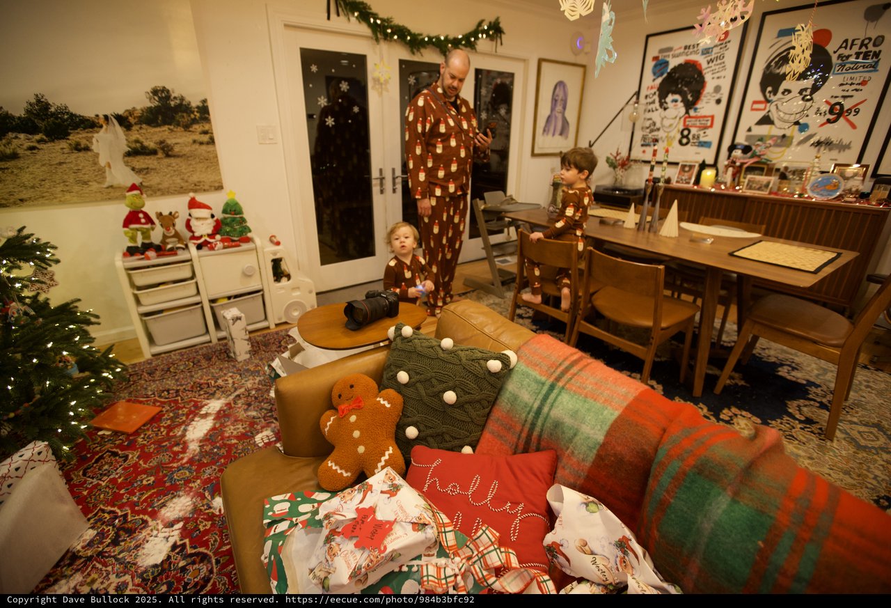 Family Christmas Morning in Festive Living Room