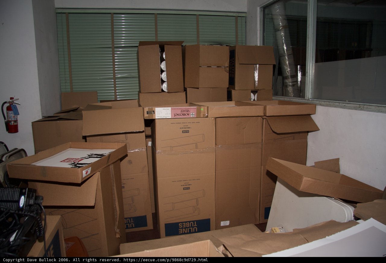 The Stack of 9 Cardboard Boxes