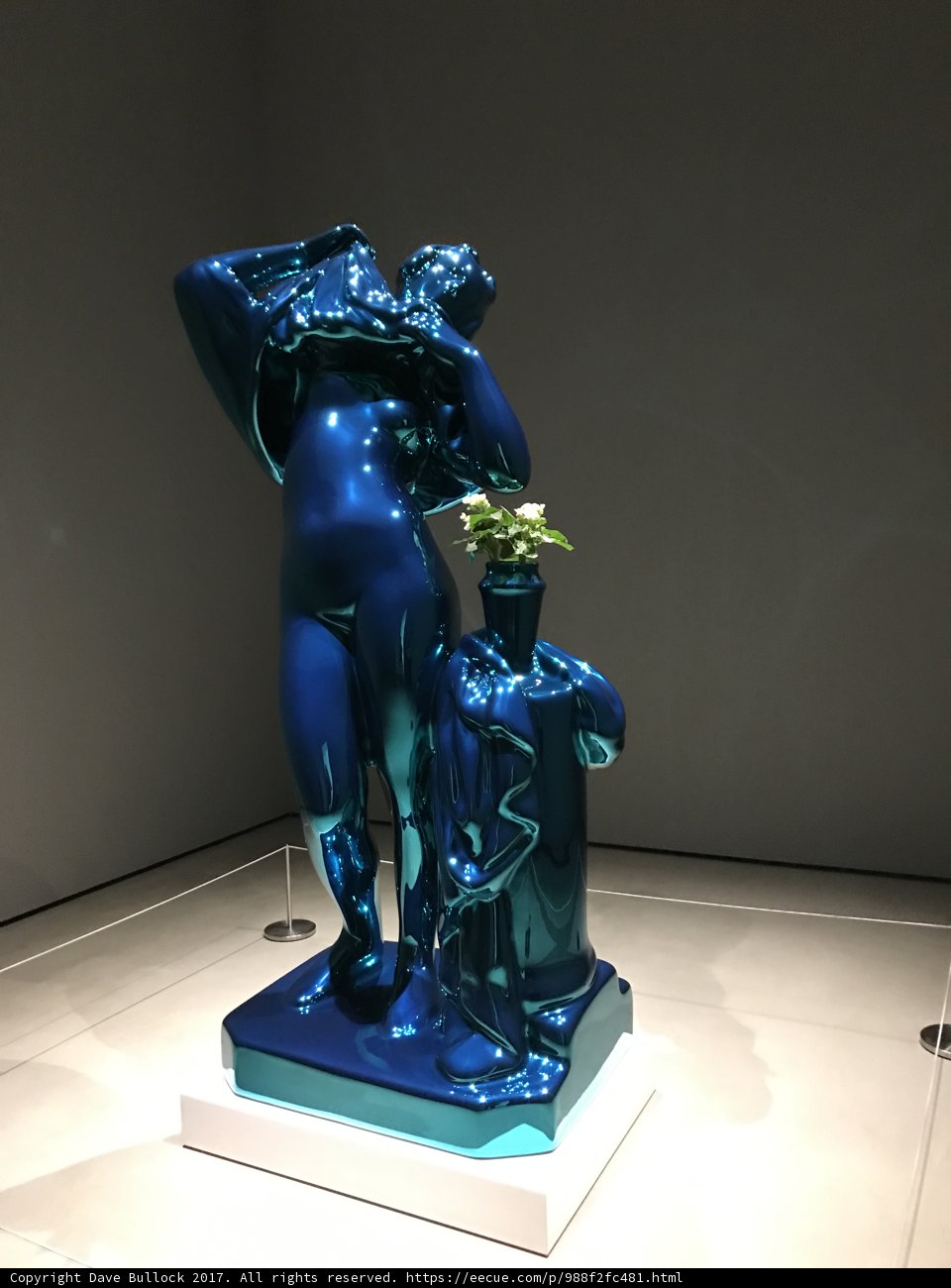 The Blue Statue with a Plant