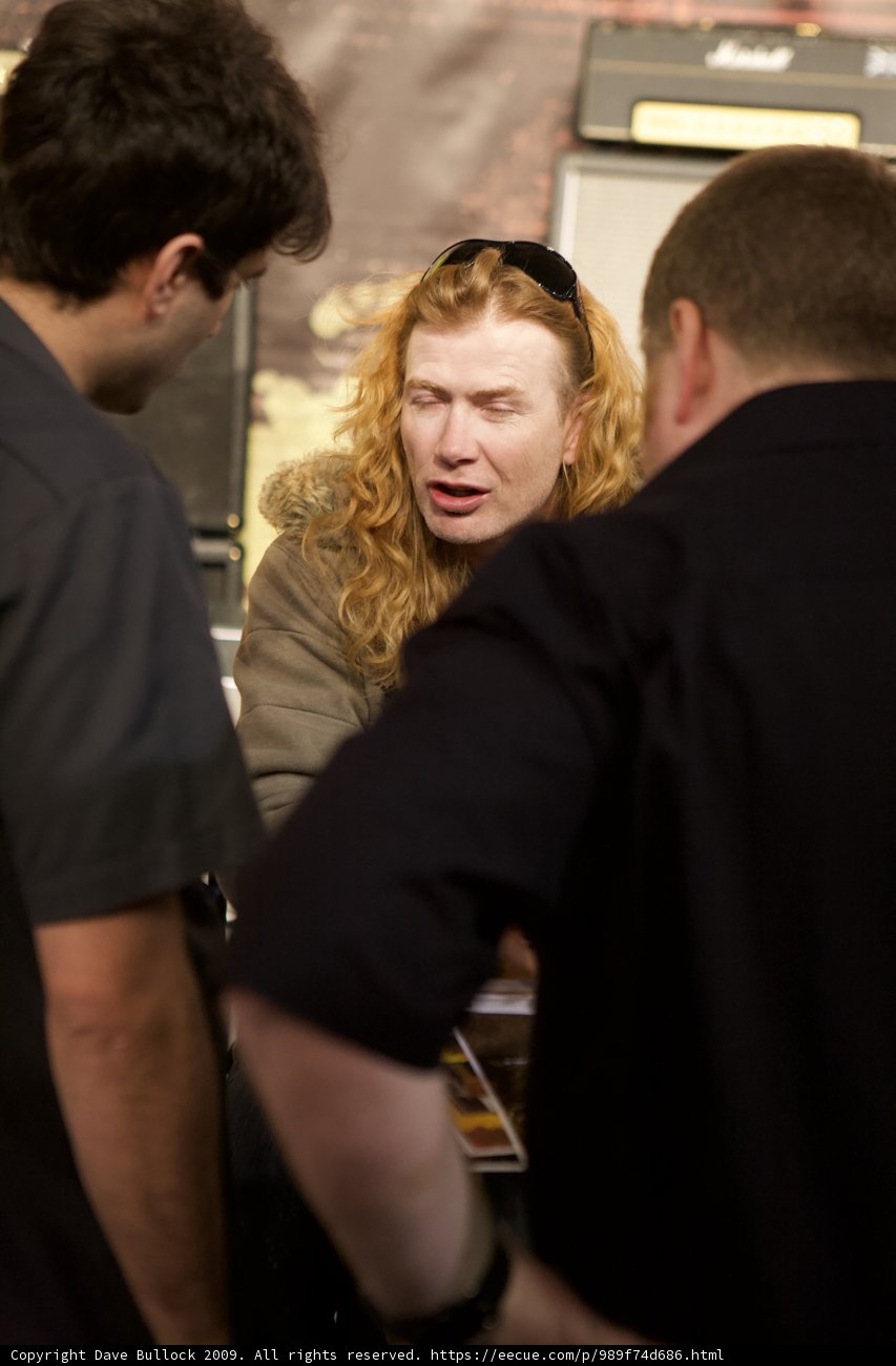 Two Men Conversing at NAMM Convention