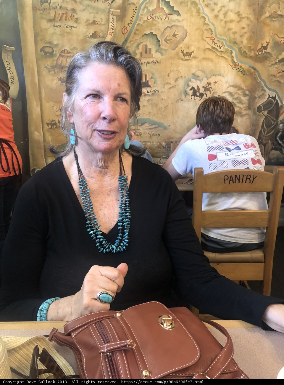 A Lady and Her Handbags