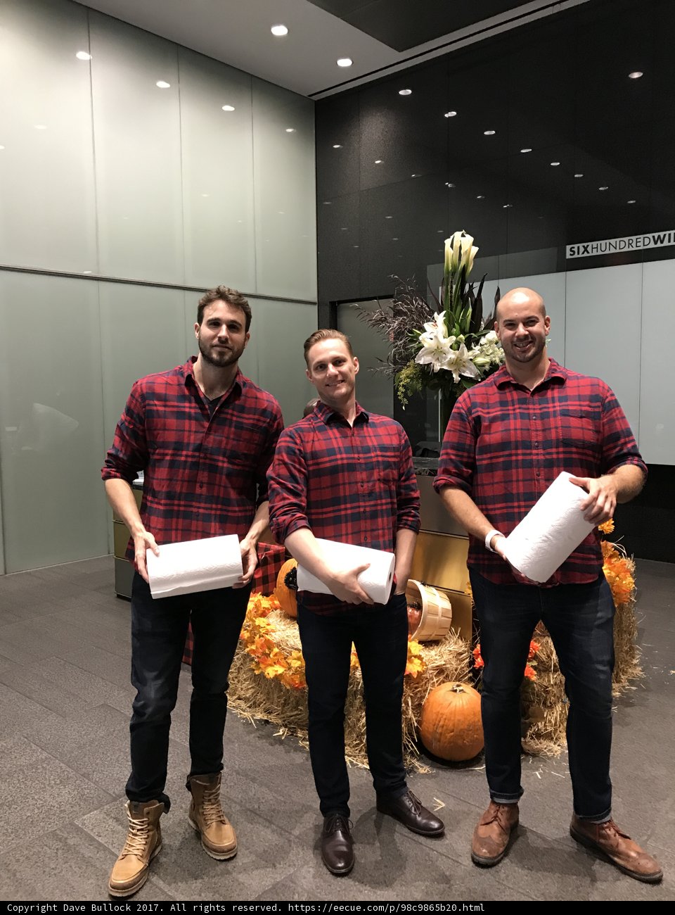 Three Men With Flower Arrangements