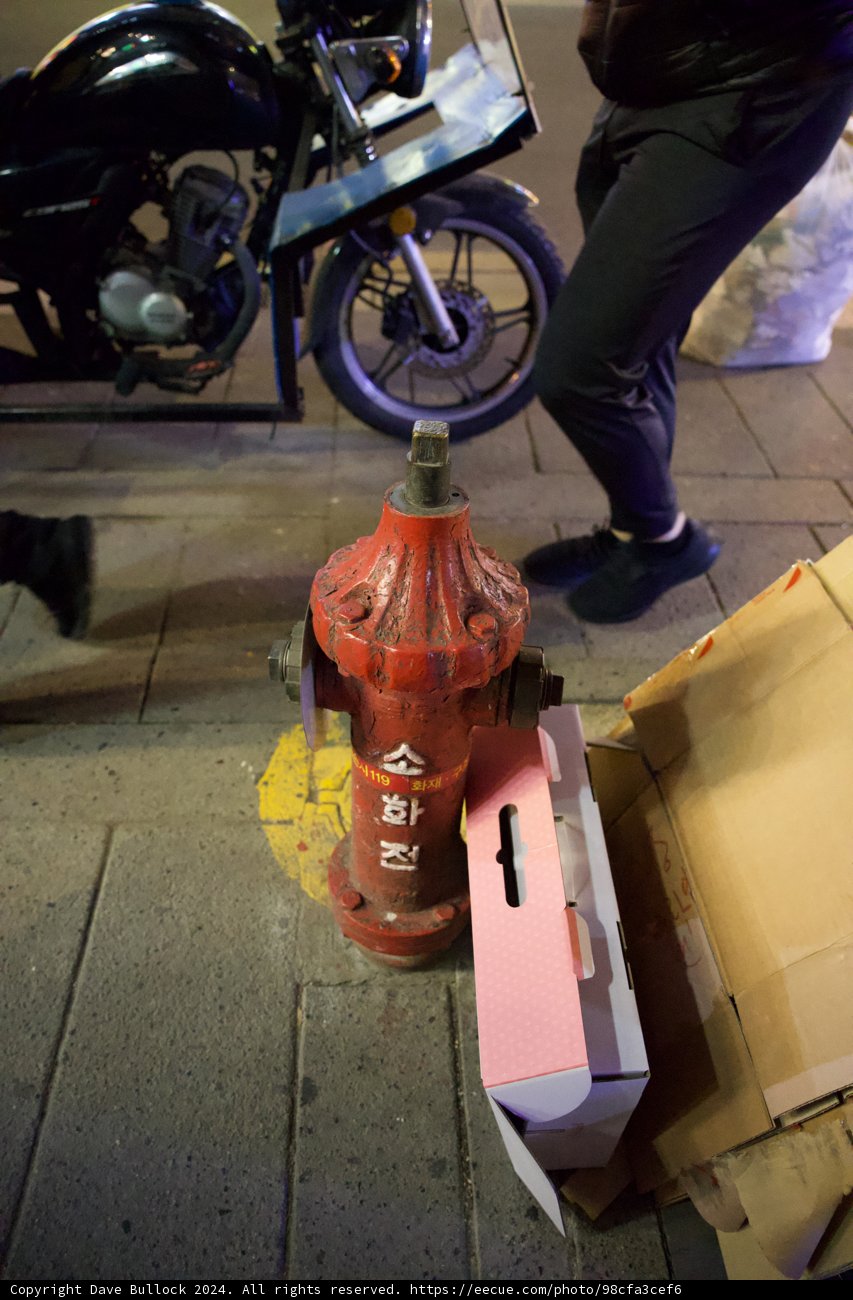 Urban Contrast: Fire Hydrant and Box