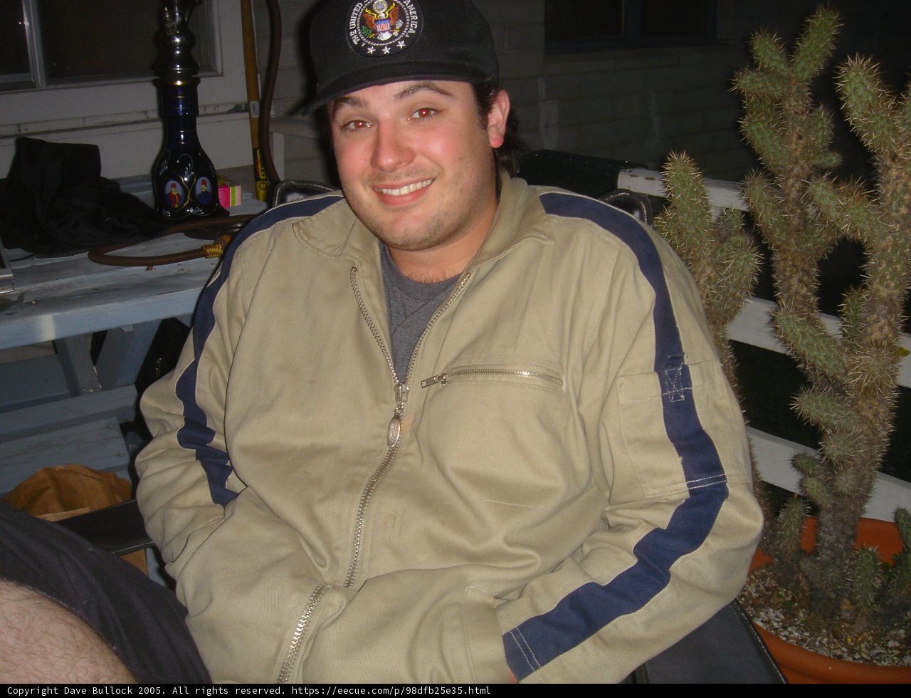 Black Hat Man with Potted Plants