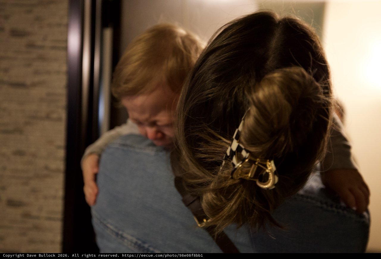Intimate Embrace: Three Women Sharing a Warm Hug