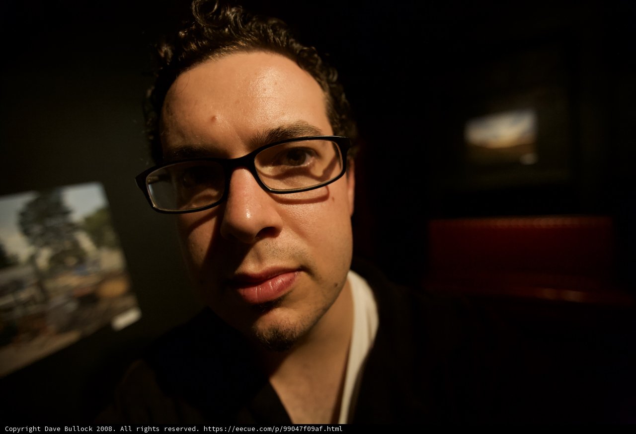 Portrait of a Happy Man with Glasses
