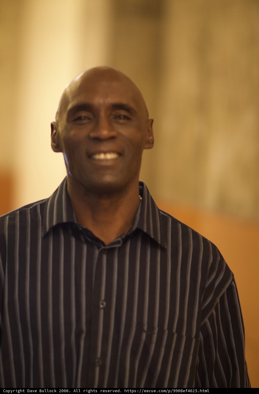 Happy Bald Man in Stripe Shirt
