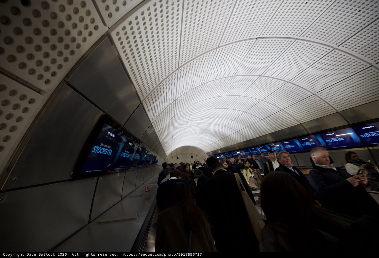 Curved Escalator Tunnel at Canary Wharf Underground Station