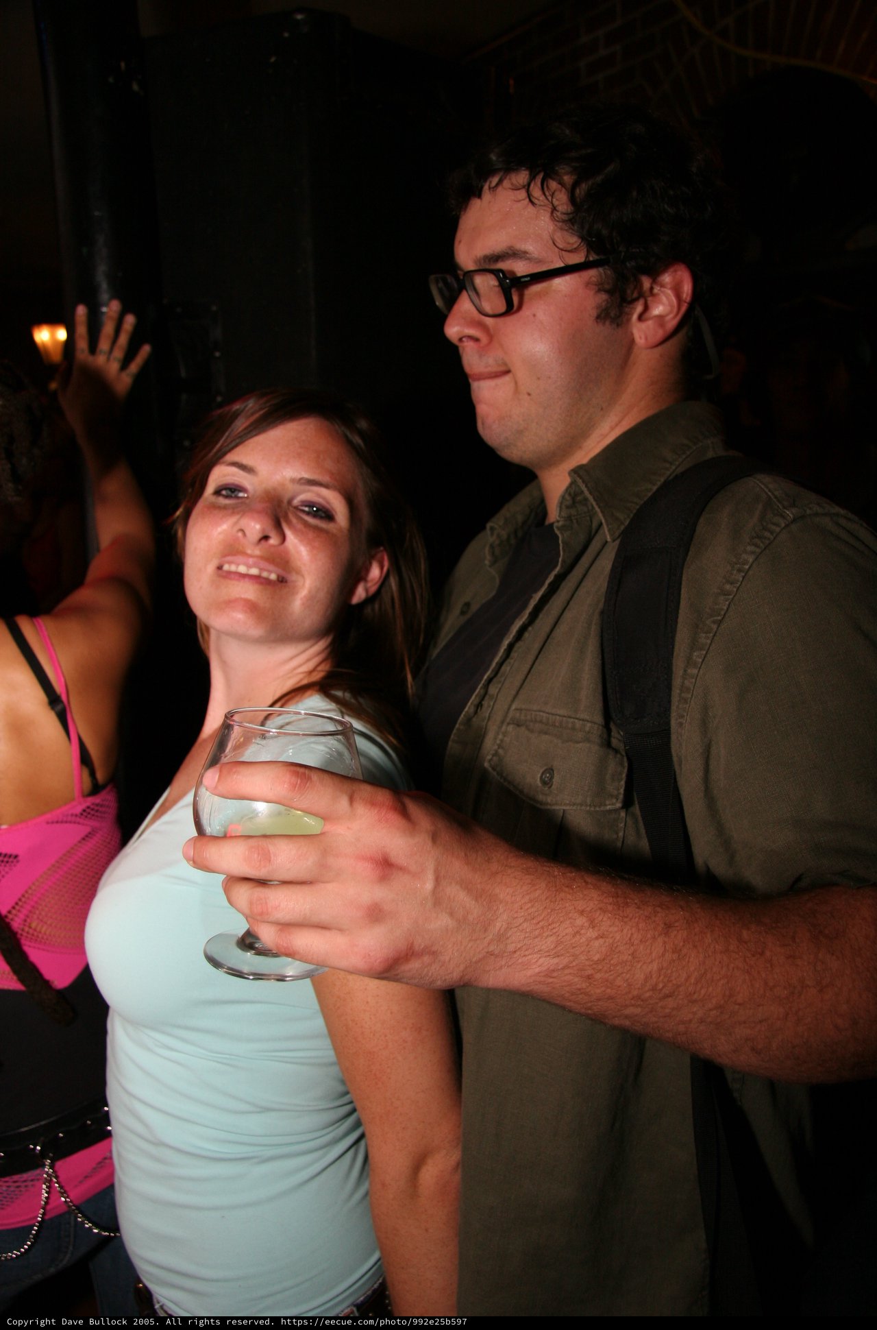 Couple Sharing a Drink at a Nightclub Party