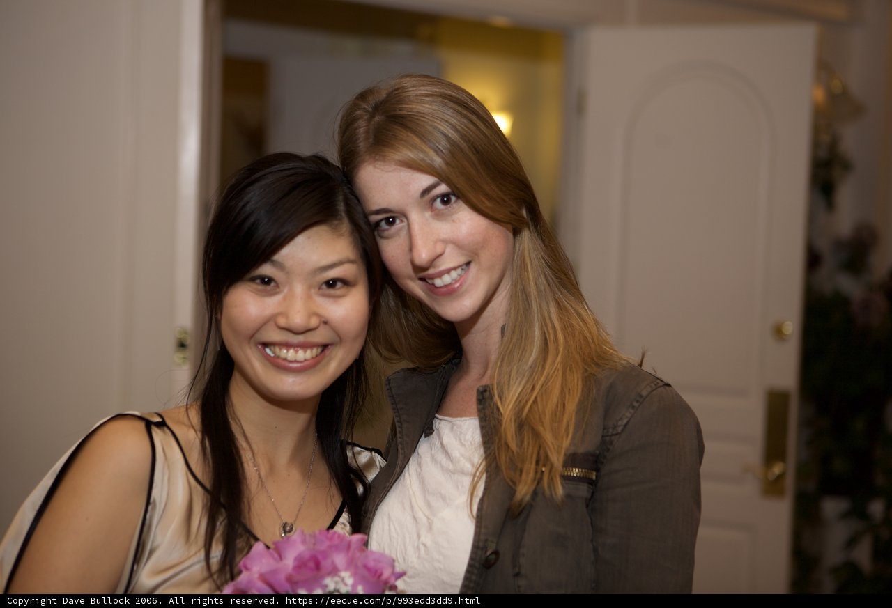 Two lovely ladies and a beautiful floral display