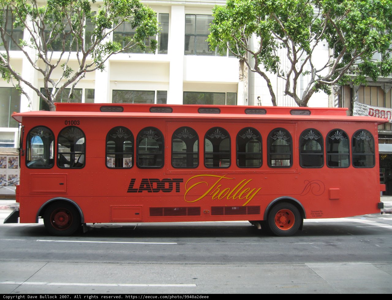 Red Bus Resting on the Roadside