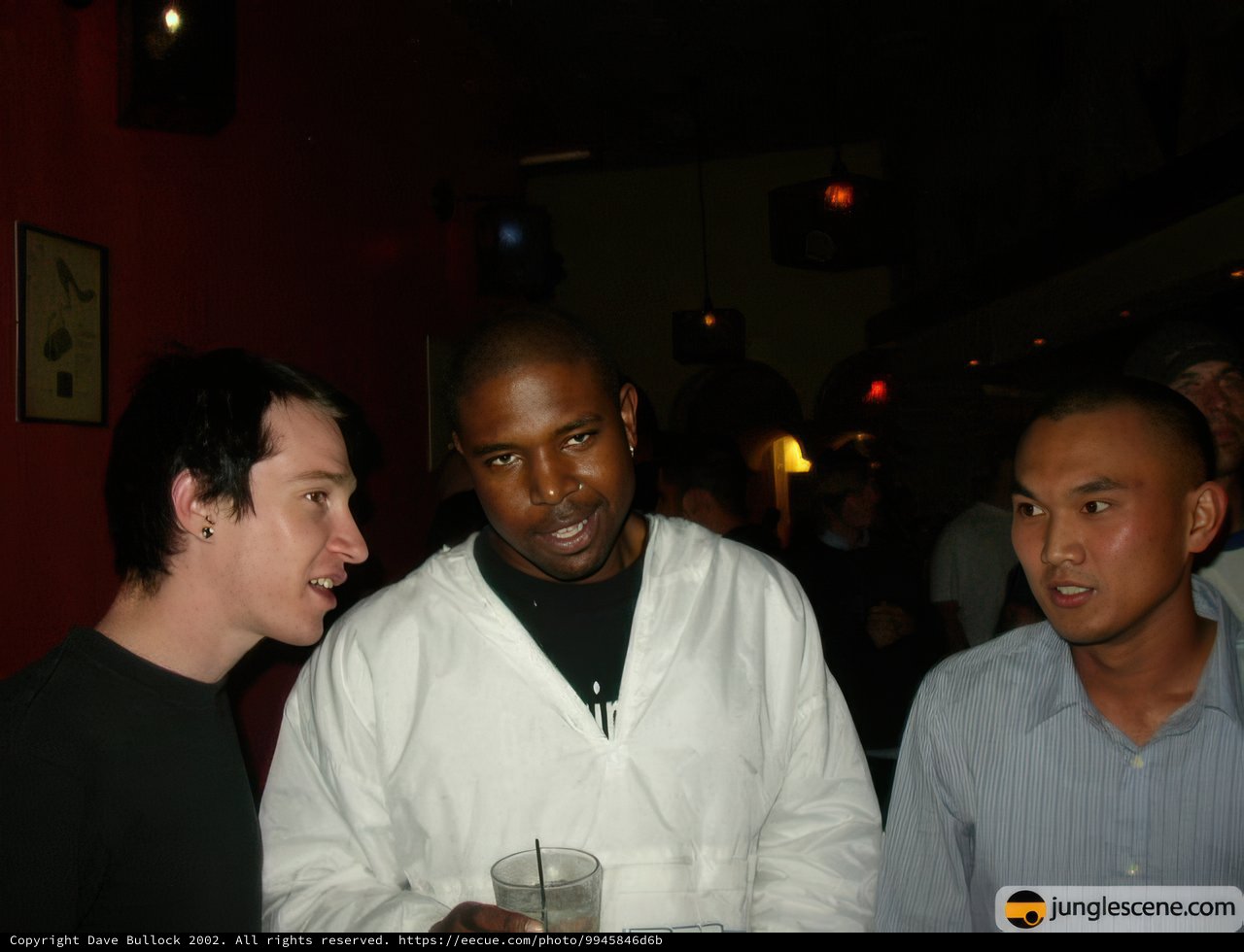 Men bonding over drinks in an urban pub