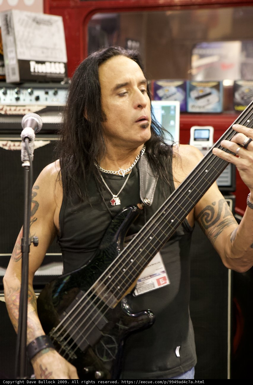 Bass Player with a Tattooed Edge