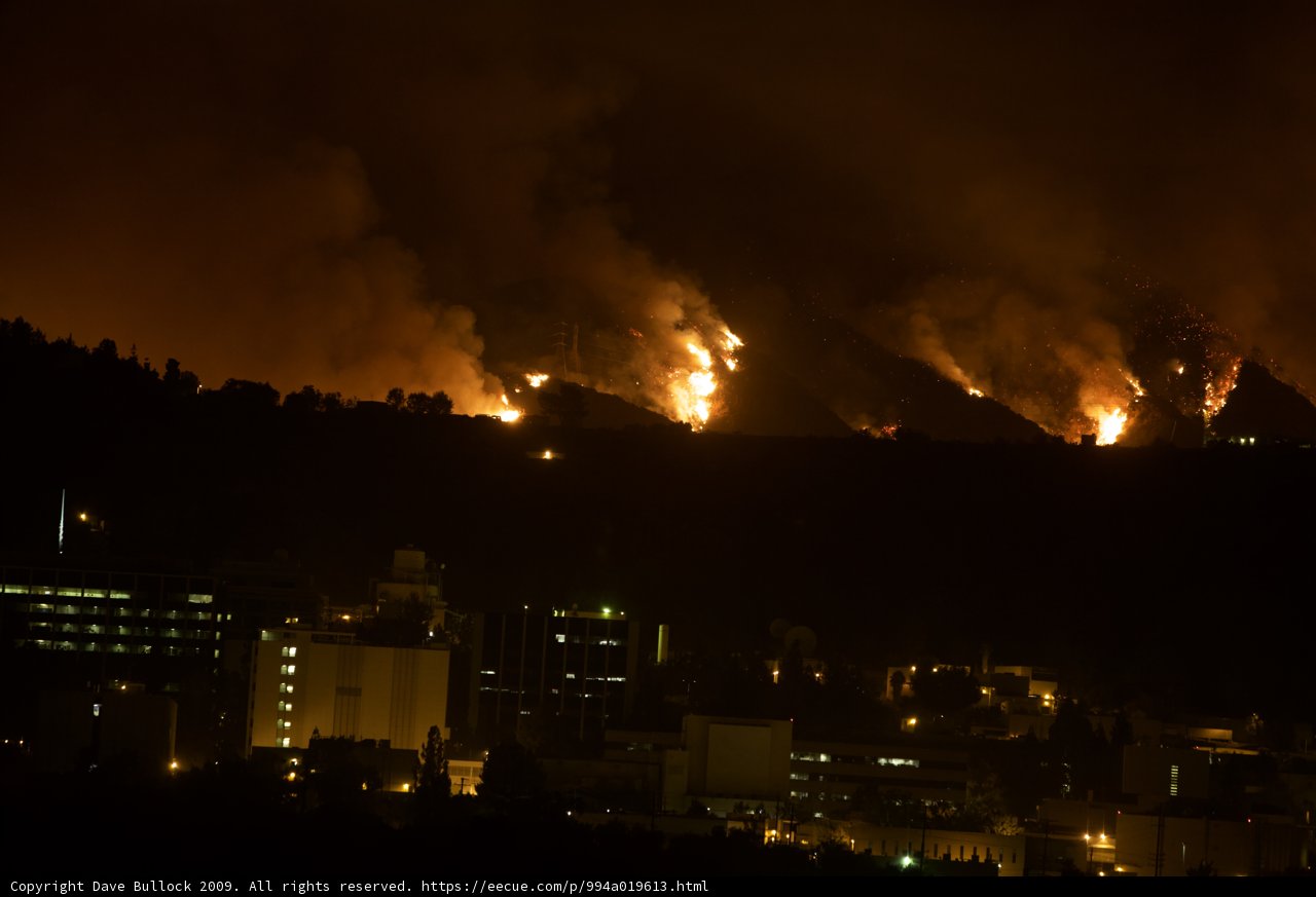 Flames Sweeping Through the Hills Above