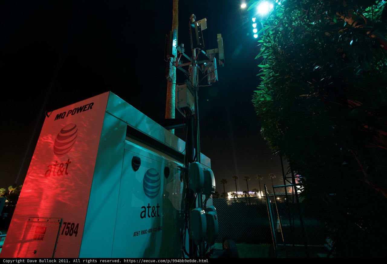 Illuminated Cell Phone Tower at Night
