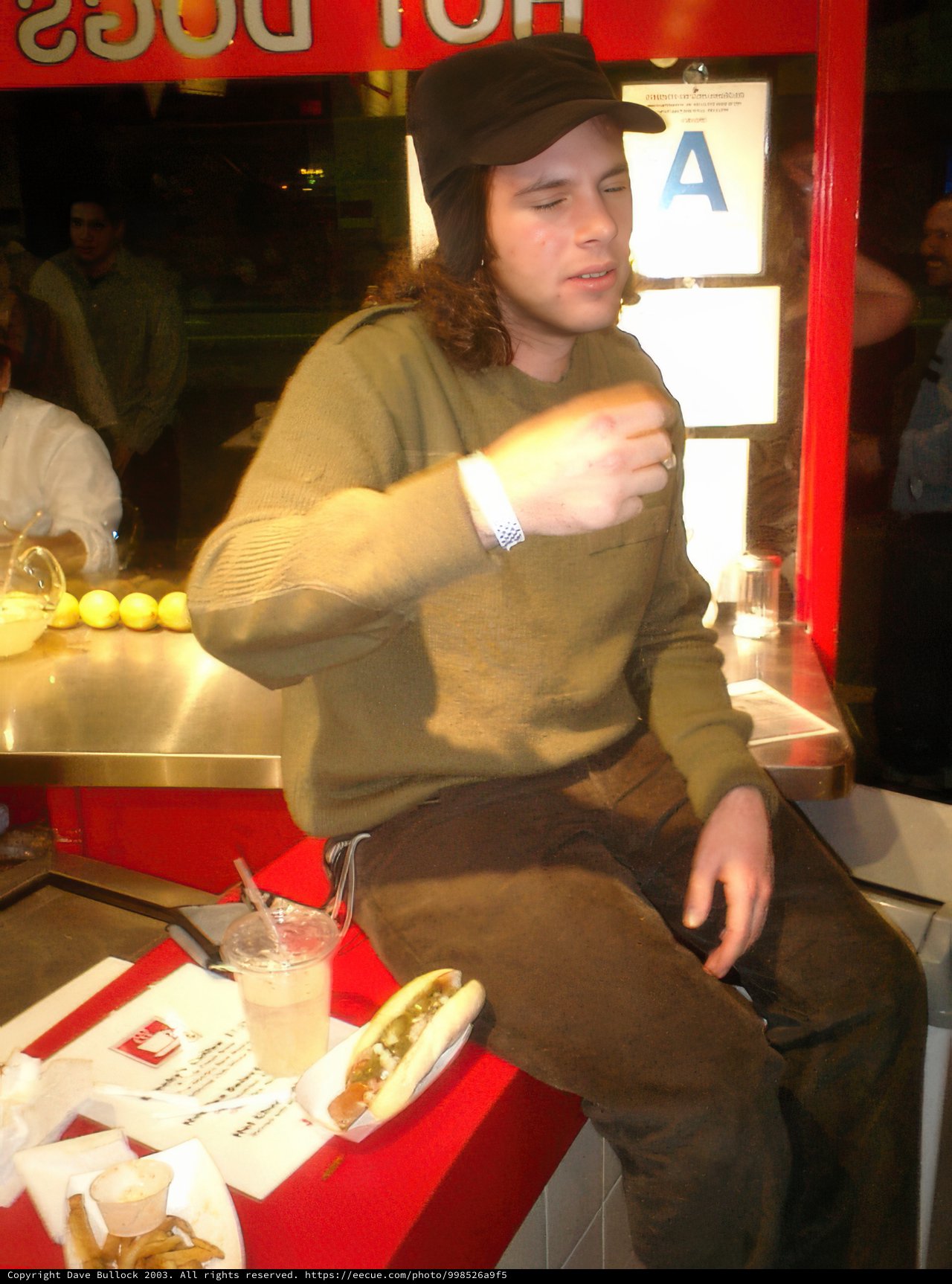 Enjoying a Delicious Hot Dog at the Restaurant