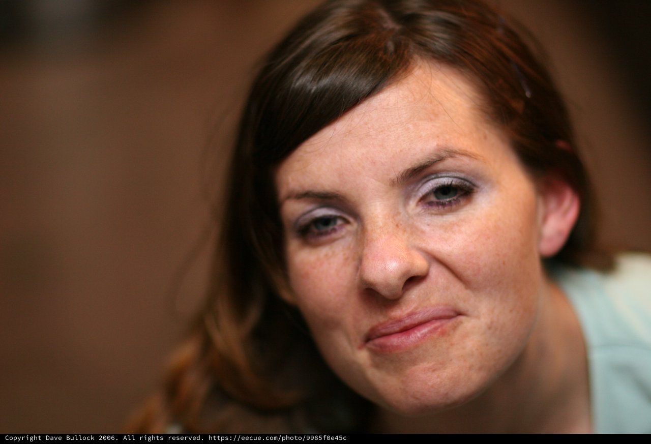 Candid Portrait of a Woman with a Knowing Smirk
