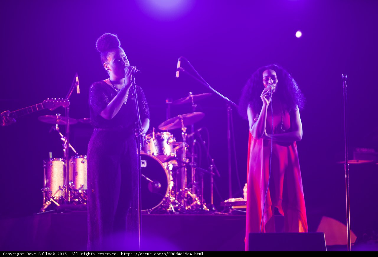 Solange And Backing Vocalist Full Shot Red Dress Black Dress Drum Kit Purple
