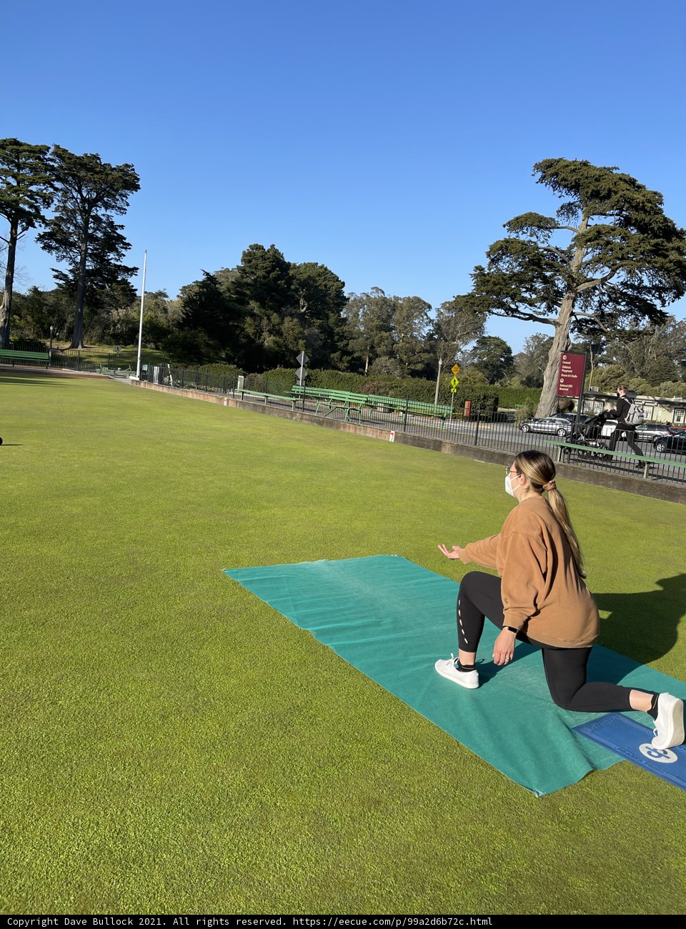 Practicing Pilates on a Serene Green Field