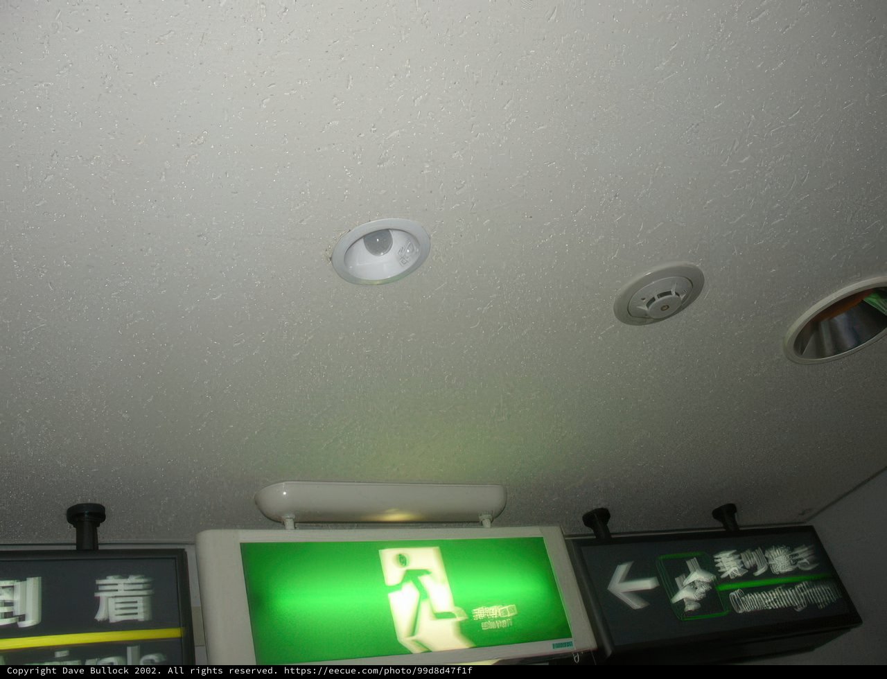 Green Sign Above Ceilings