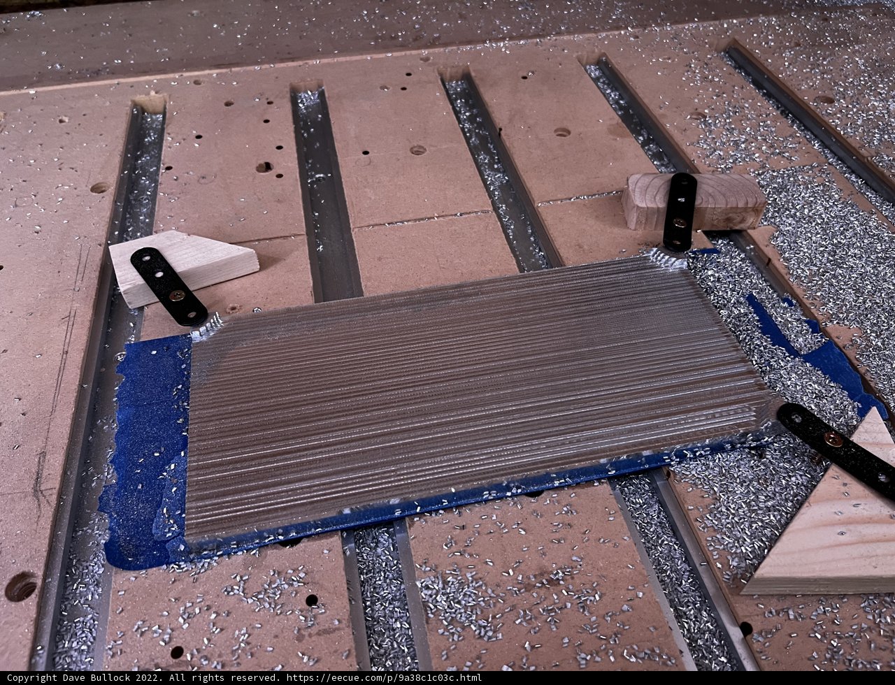 Metal Piece Resting on Wooden Surface