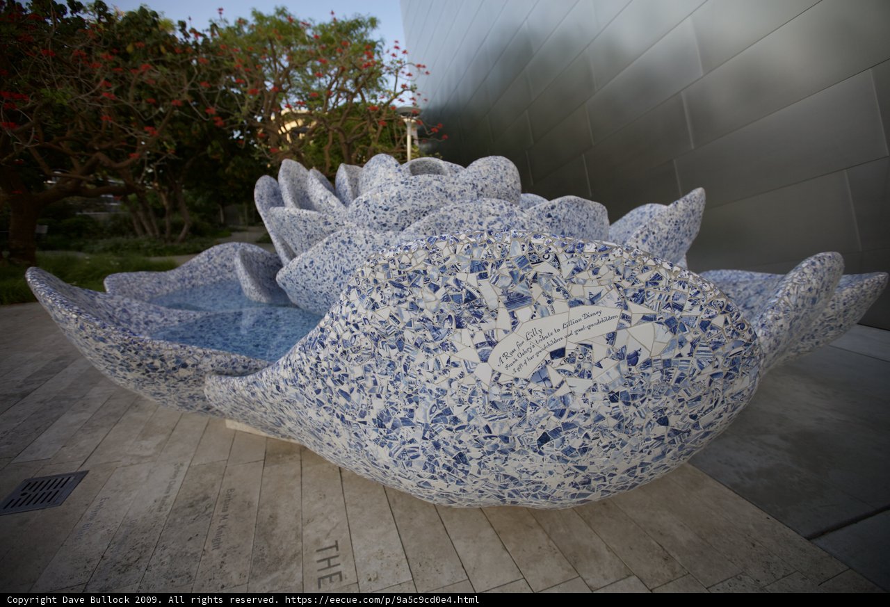 Blue and White Porcelain Sphere on Flagstone Floor