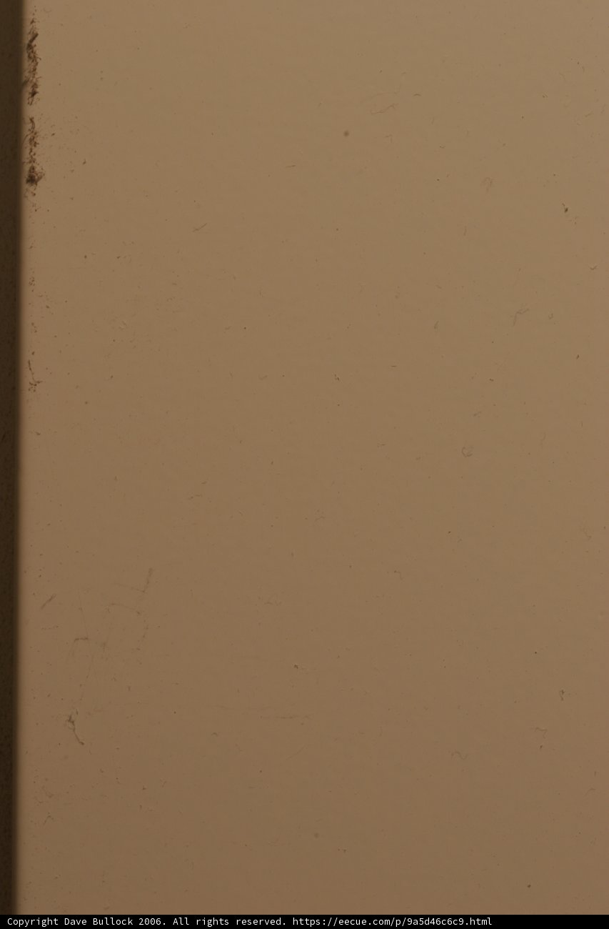 Black Mark on White Wall