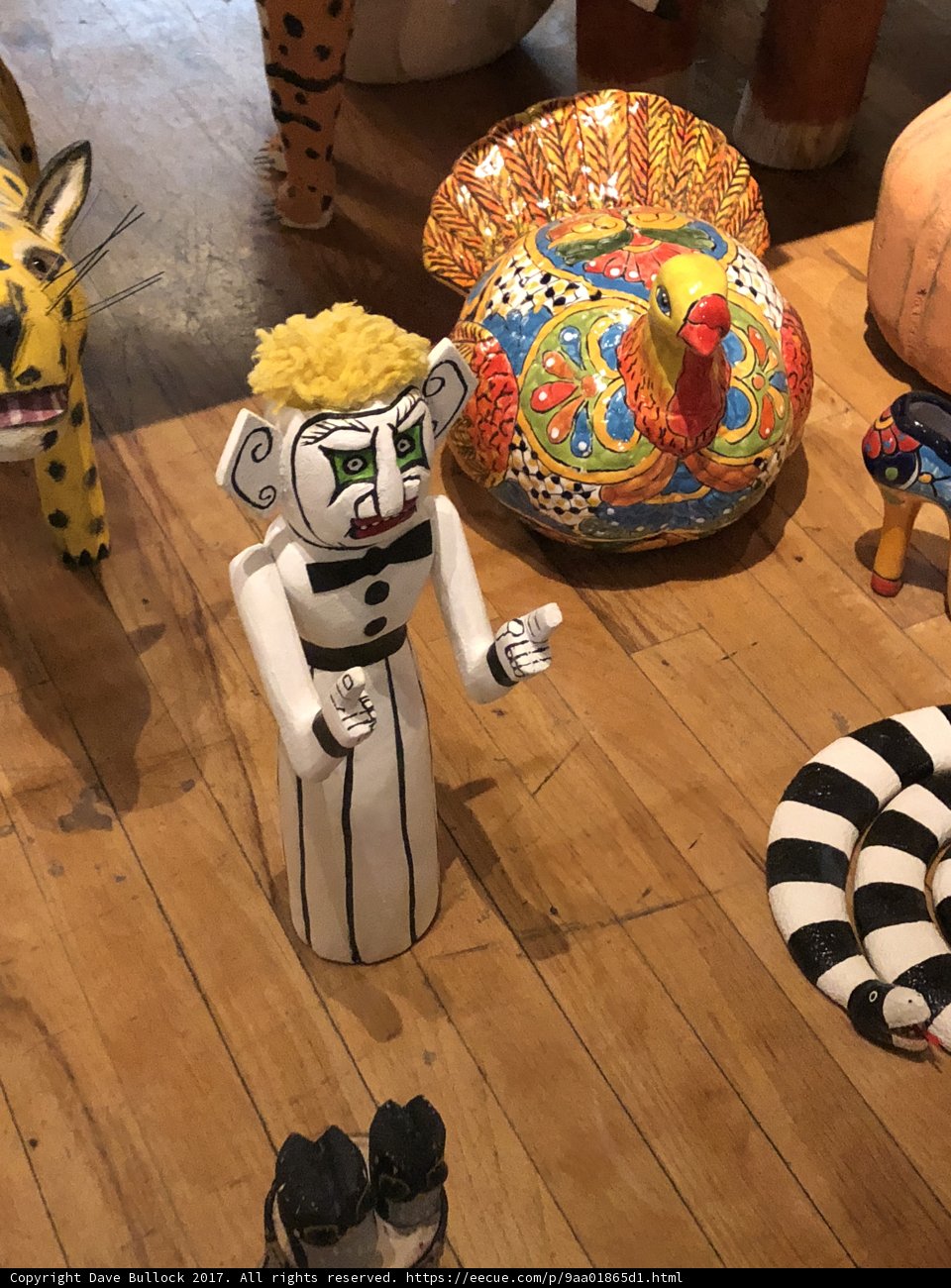 A Showcase of Handcrafted Wooden Statues and Animals