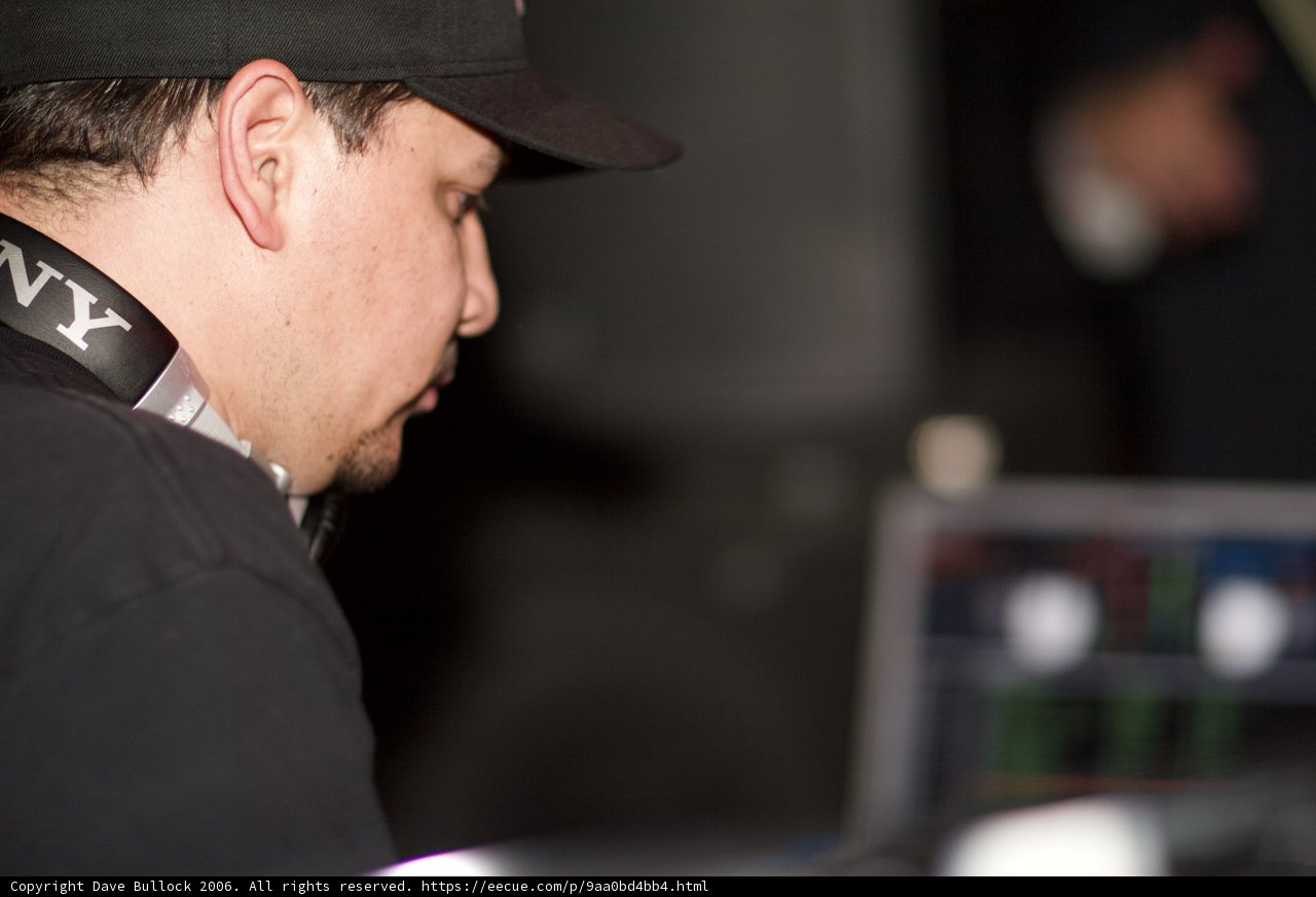 Man in Black Shirt and Baseball Cap